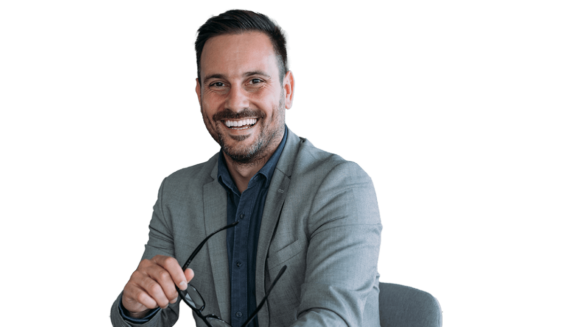 smiling man in business jacket holding glasses