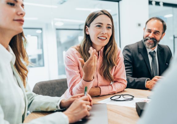 Professional woman making a point during a meeting